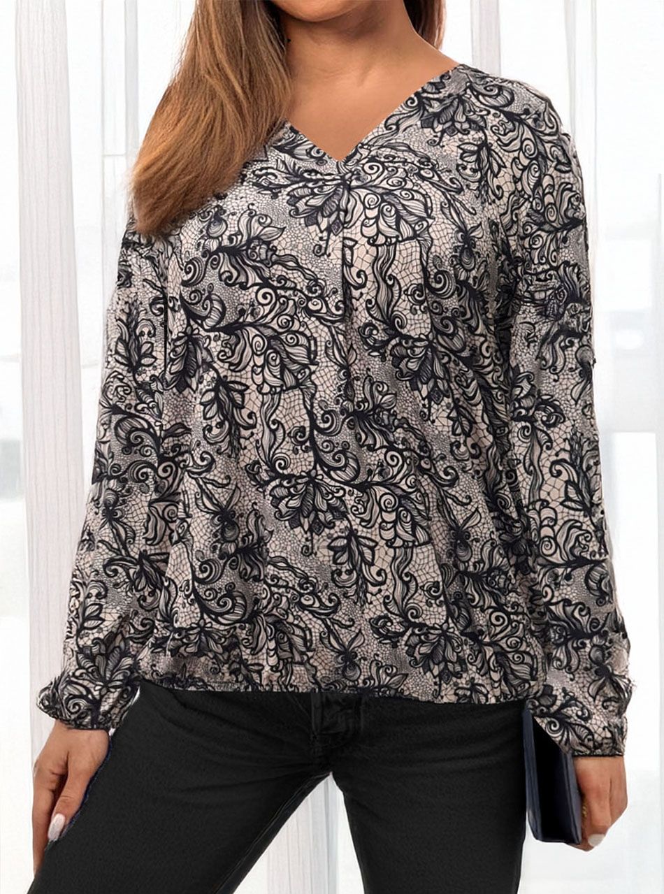 Alján ,ujján gumírozott, V kivágású mintás felső V.