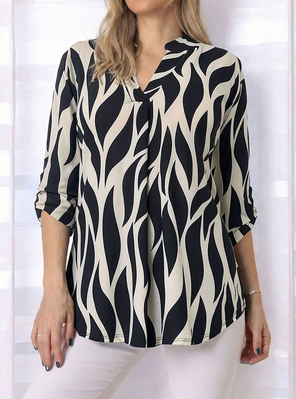 Felgombolhatú ujjú, V kivágású  mintás felső I.