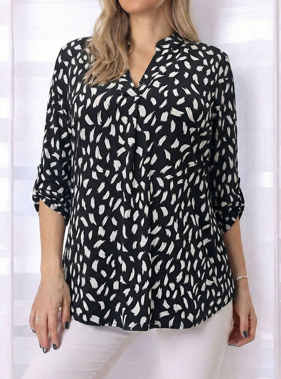 Felgombolhatú ujjú, V kivágású  mintás felső VI.