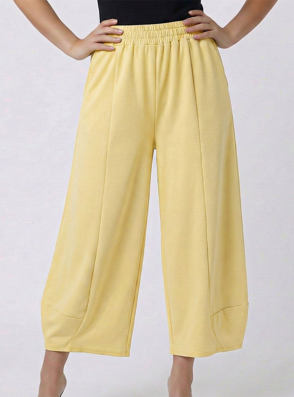 Gumis derekú, bő fazonú zsebes nadrág (sárga)