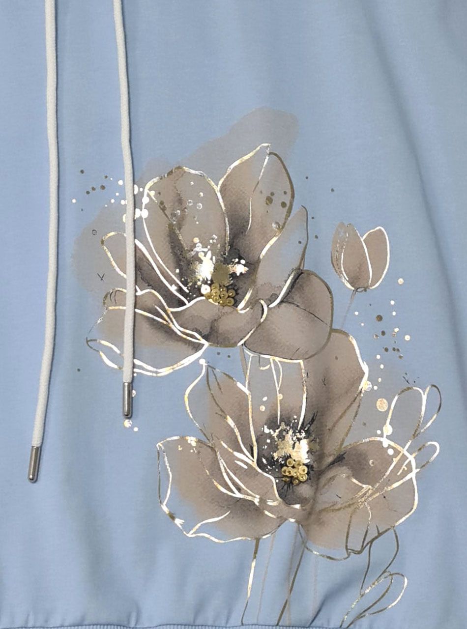 Nyaknál húzható, passzés aljú virág mintás felső (világoskék)