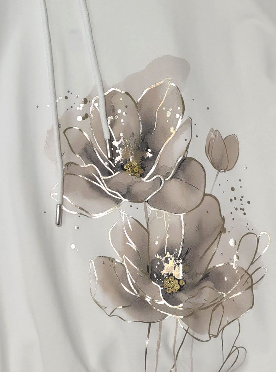 Nyaknál húzható, passzés aljú virág mintás felső (fehér)