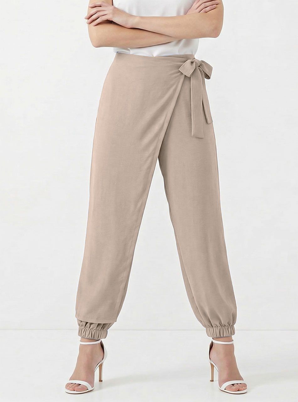 Átlapolt, lenge nadrág (bézs)